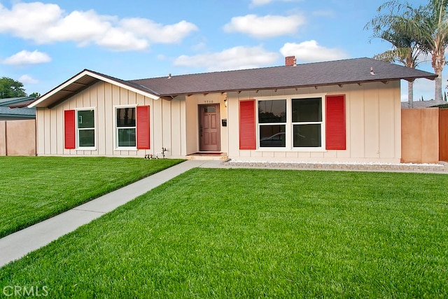 7710 Shoup Ave, West Hills, CA 91304 - ranch-style home with board and batten siding, a chimney, and a shingled roof