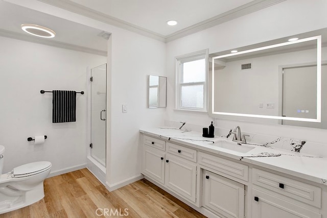 7710 Shoup Ave, West Hills, CA 91304 - full bath with toilet, double vanity, a stall shower, wood finished floors, and baseboards