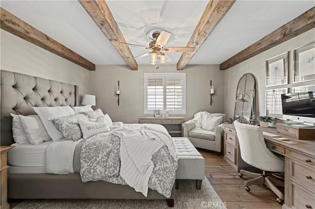 5239 Jade Ct, Lancaster, CA 93536 - bedroom with light wood finished floors, a desk, beam ceiling, and a ceiling fan