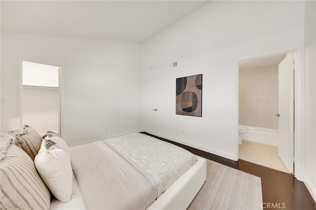 187 S Catalina Ave Unit 4, Pasadena, CA 91106 - bedroom featuring wood finished floors and a walk in closet