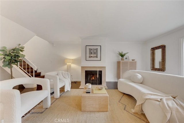 187 S Catalina Ave Unit 4, Pasadena, CA 91106 - living area featuring a lit fireplace, crown molding, and wood finished floors