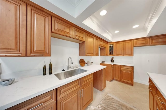 187 S Catalina Ave Unit 4, Pasadena, CA 91106 - kitchen with a sink, brown cabinets, ornamental molding, recessed lighting, and light tile patterned flooring