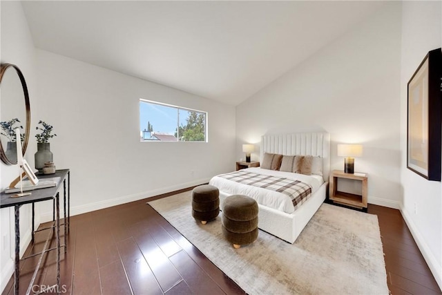 187 S Catalina Ave Unit 4, Pasadena, CA 91106 - bedroom with lofted ceiling, dark wood finished floors, and baseboards