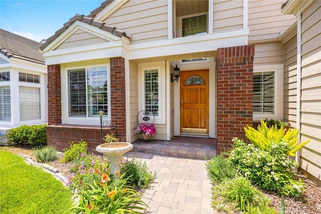 5787 Blackbird Ln, La Verne, CA 91750 - view of exterior entry featuring brick siding and a porch