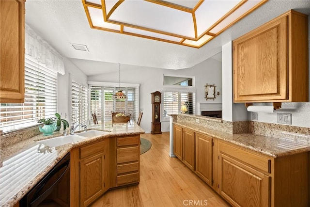 5787 Blackbird Ln, La Verne, CA 91750 - kitchen featuring a sink, a peninsula, dishwasher, and light wood finished floors