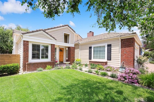 5787 Blackbird Ln, La Verne, CA 91750 - view of front facade featuring brick siding, a chimney, and a tile roof