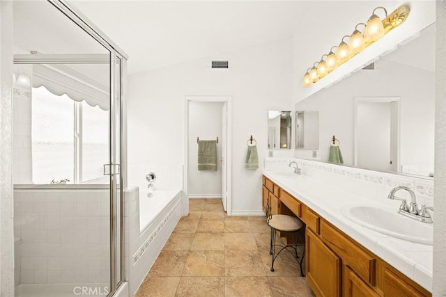 5787 Blackbird Ln, La Verne, CA 91750 - full bathroom featuring double vanity, a shower stall, a bath, lofted ceiling, and baseboards