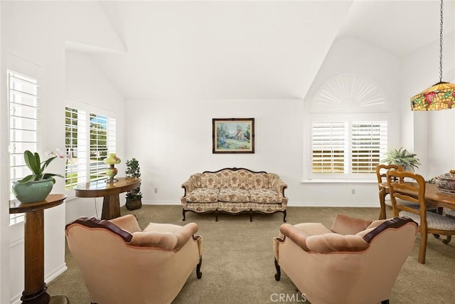 5787 Blackbird Ln, La Verne, CA 91750 - living area featuring vaulted ceiling, carpet floors, and baseboards