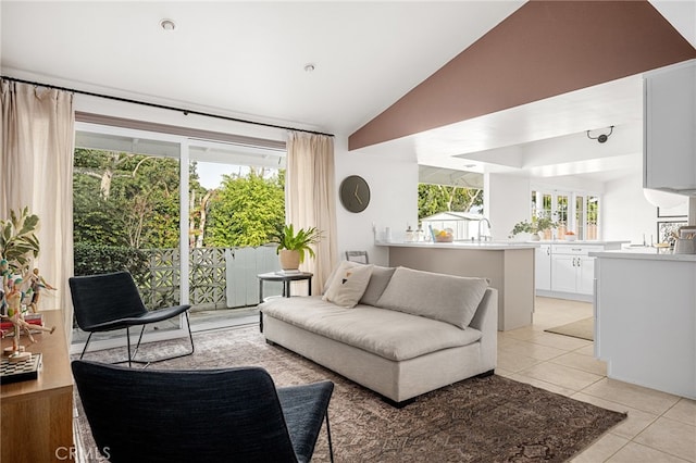 3231 Ruth Elaine Dr, Los Alamitos, CA 90720 - living area with lofted ceiling and light tile patterned floors