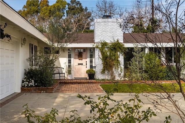 3231 Ruth Elaine Dr, Los Alamitos, CA 90720 - doorway to property with a chimney