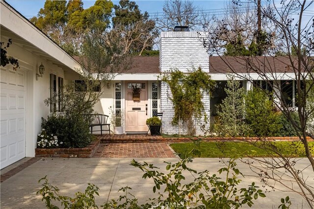 3231 Ruth Elaine Dr, Los Alamitos, CA 90720 - doorway to property with a chimney