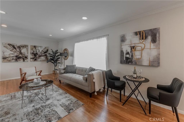 7704 Isis Ave, Los Angeles, CA 90045 - living room with crown molding, recessed lighting, wood finished floors, and baseboards