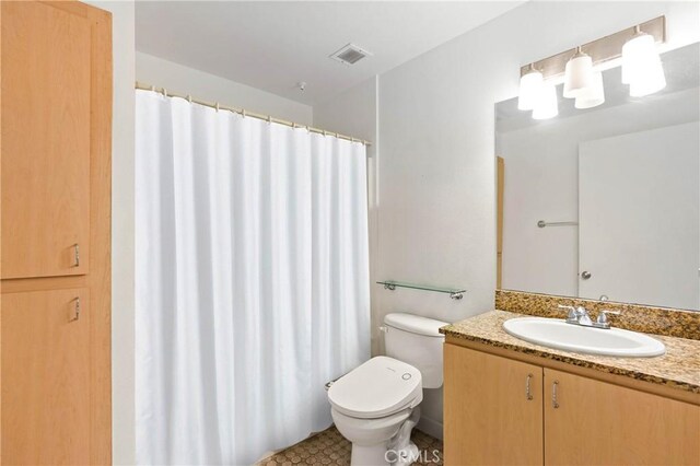 630 W 6th St Unit 215, Los Angeles, CA 90017 - full bathroom with vanity and toilet