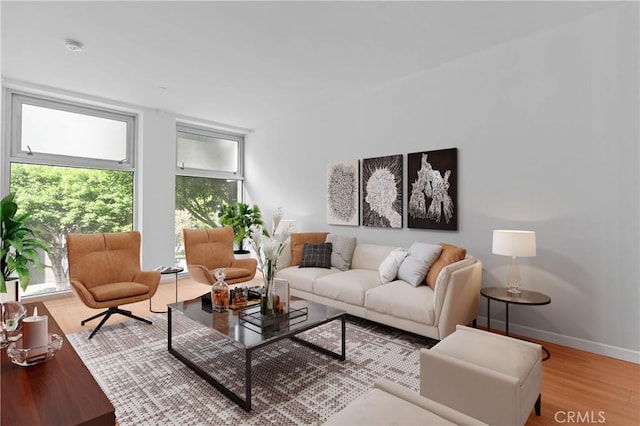 630 W 6th St Unit 215, Los Angeles, CA 90017 - living room with wood finished floors and baseboards