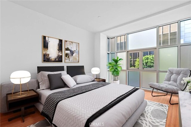 630 W 6th St Unit 215, Los Angeles, CA 90017 - bedroom with wood finished floors