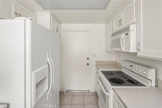 2726 Torrey Pine Dr Unit 12, Fullerton, CA 92835 - kitchen with white appliances, light countertops, and white cabinetry