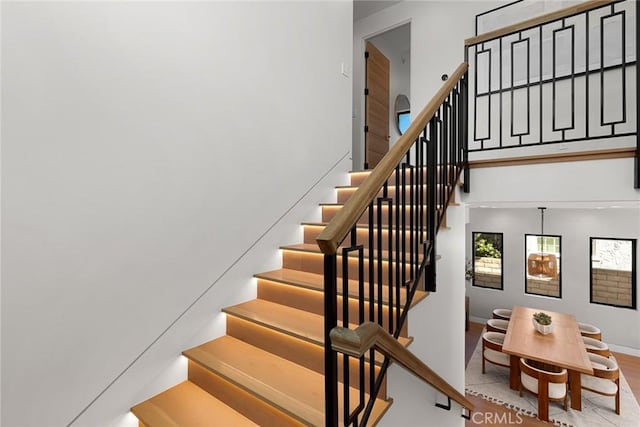22640 Clarendon St, Woodland Hills, CA 91367 - staircase featuring baseboards