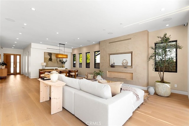 22640 Clarendon St, Woodland Hills, CA 91367 - living area with light wood-style flooring and recessed lighting