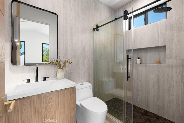 22640 Clarendon St, Woodland Hills, CA 91367 - full bath with healthy amount of natural light, vanity, a shower stall, and tile walls