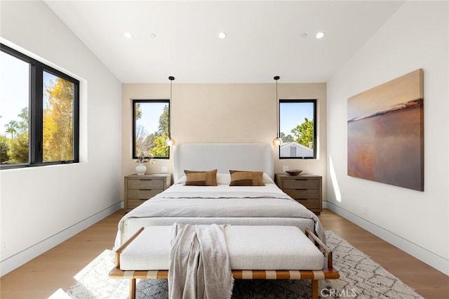 22640 Clarendon St, Woodland Hills, CA 91367 - bedroom featuring multiple windows, recessed lighting, and light wood-style floors