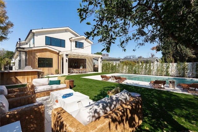 22640 Clarendon St, Woodland Hills, CA 91367 - back of property with an outdoor living space, a patio area, and a fenced backyard