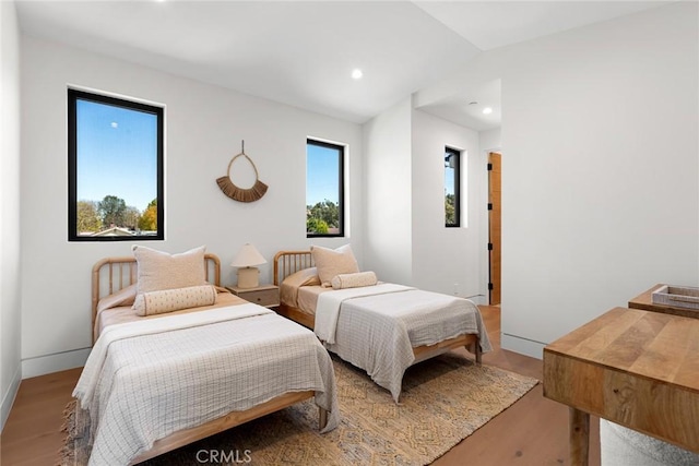 22640 Clarendon St, Woodland Hills, CA 91367 - bedroom with light wood-style floors, recessed lighting, and vaulted ceiling