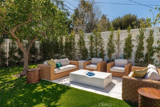 22640 Clarendon St, Woodland Hills, CA 91367 - fenced backyard featuring an outdoor living space and a patio