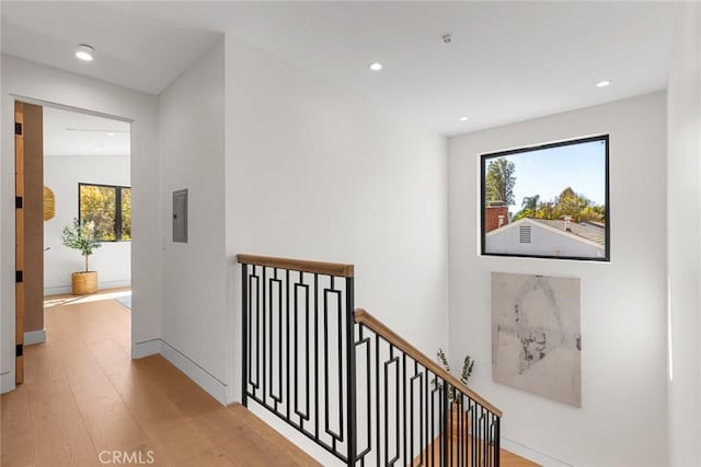 22640 Clarendon St, Woodland Hills, CA 91367 - hall featuring wood finished floors, an upstairs landing, recessed lighting, and electric panel