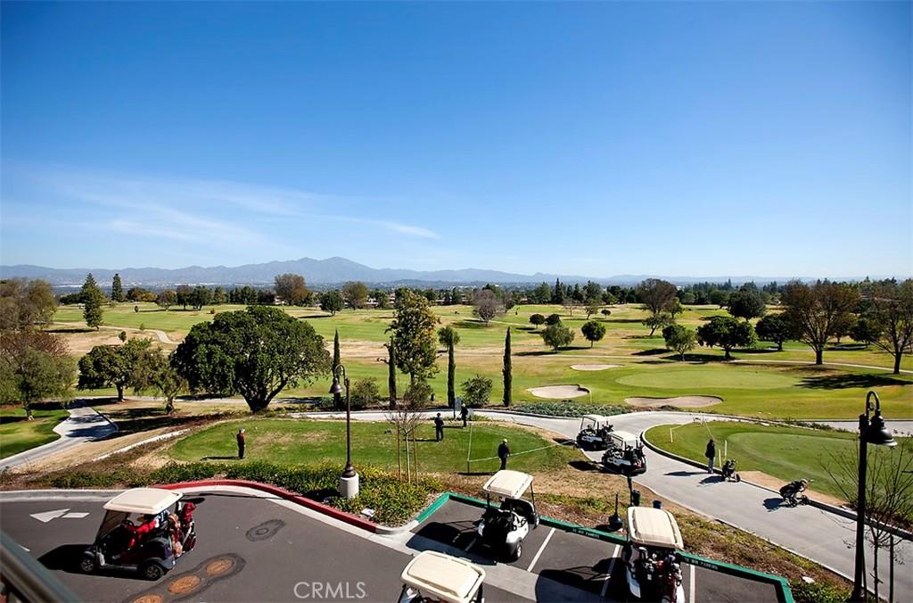 24055 S Paseo Del Lago Unit 712, Laguna Woods, CA 92637 - view of home's community featuring a mountain view, golf course view, and a yard