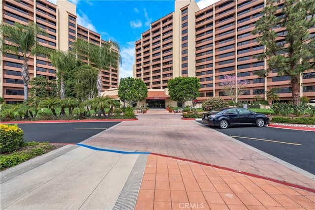 24055 S Paseo Del Lago Unit 712, Laguna Woods, CA 92637 - view of building exterior featuring uncovered parking