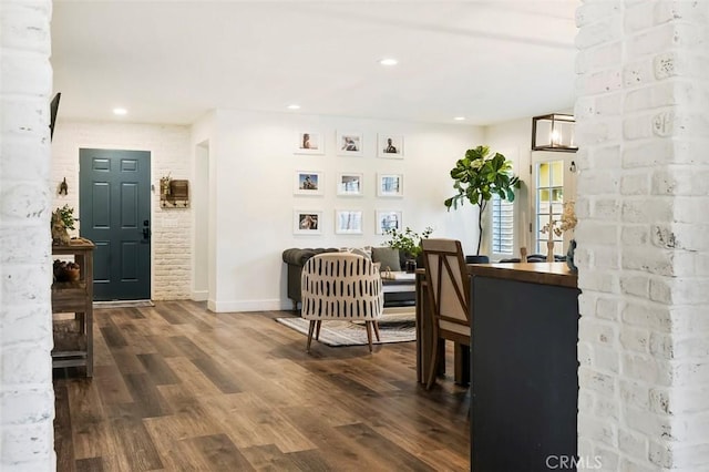 4326 Forest Ranch Rd, Oceanside, CA 92057 - dining space featuring wood finished floors, recessed lighting, brick wall, and baseboards