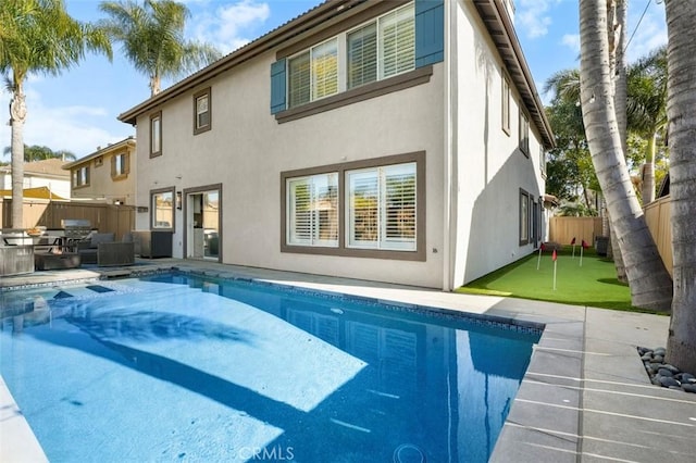 4326 Forest Ranch Rd, Oceanside, CA 92057 - back of property featuring stucco siding, a fenced backyard, a patio, and area for grilling