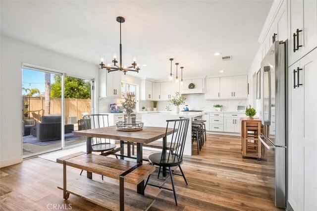 4326 Forest Ranch Rd, Oceanside, CA 92057 - dining area featuring light wood-style floors, a chandelier, and recessed lighting