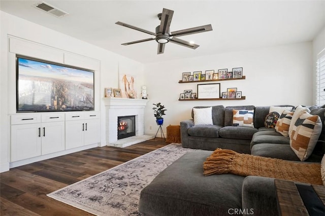 4326 Forest Ranch Rd, Oceanside, CA 92057 - living area featuring ceiling fan, dark wood-style floors, and a glass covered fireplace