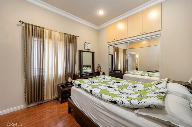 10610 Oak Tree Way, Sunland, CA 91040 - bedroom featuring crown molding, wood finished floors, baseboards, and recessed lighting
