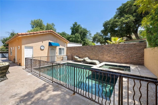 10610 Oak Tree Way, Sunland, CA 91040 - view of swimming pool with a patio area, an in-ground hot tub, and a fenced backyard