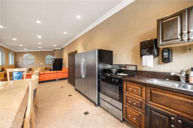 10610 Oak Tree Way, Sunland, CA 91040 - kitchen featuring stainless steel appliances, ornamental molding, a sink, recessed lighting, and light tile patterned floors