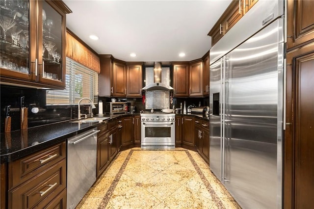10610 Oak Tree Way, Sunland, CA 91040 - kitchen featuring high end appliances, inlaid floor details, wall chimney exhaust hood, a sink, and recessed lighting