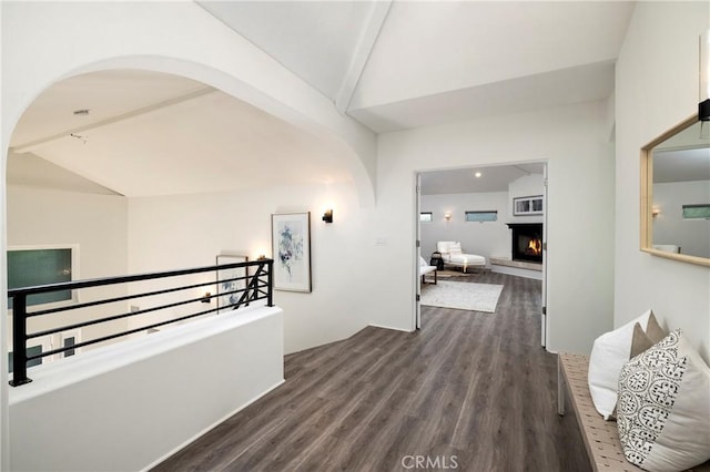 3141 Hillrose Dr, Rossmoor, CA 90720 - corridor featuring lofted ceiling, dark wood-style flooring, and arched walkways