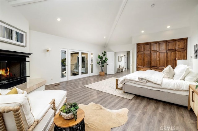 3141 Hillrose Dr, Rossmoor, CA 90720 - bedroom featuring beamed ceiling, french doors, wood finished floors, a fireplace, and recessed lighting