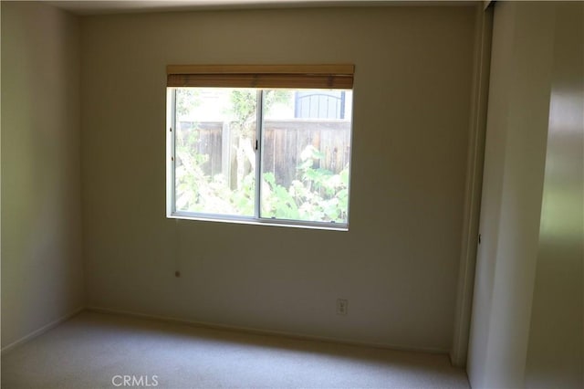 26693 Spotted Pony Dr, Corona, CA 92883 - empty room featuring light carpet and baseboards