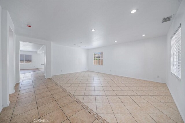 1568 Burns Ln, San Jacinto, CA 92335 - spare room with light tile patterned floors and recessed lighting
