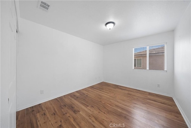 1568 Burns Ln, San Jacinto, CA 92335 - unfurnished room featuring wood finished floors and baseboards