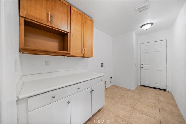 1568 Burns Ln, San Jacinto, CA 92335 - kitchen with light countertops, baseboards, and light tile patterned floors