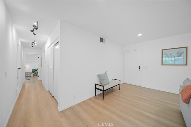 2215 Calmette Ave, Rowland Heights, CA 91748 - corridor with light wood-style flooring and baseboards