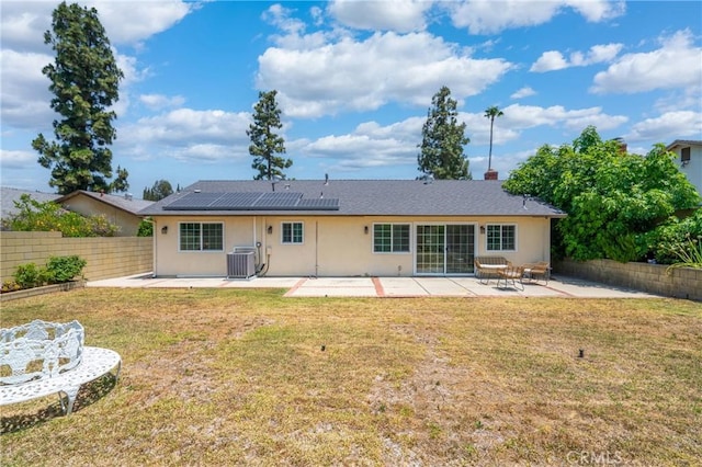2215 Calmette Ave, Rowland Heights, CA 91748 - rear view of house featuring a patio area, solar panels, a fenced backyard, and stucco siding