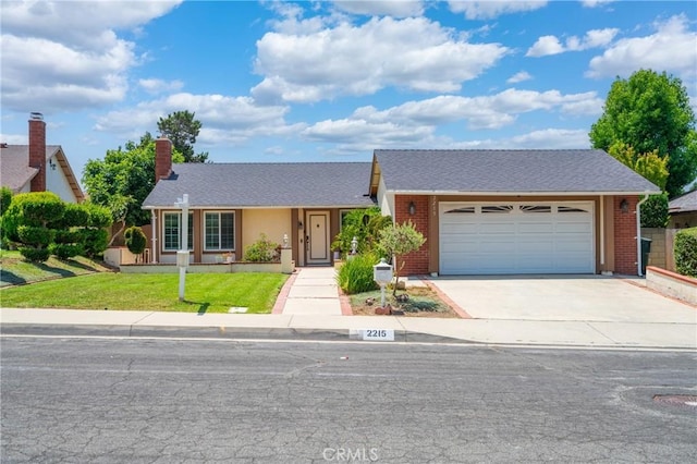 2215 Calmette Ave, Rowland Heights, CA 91748 - view of front facade with concrete driveway, a front lawn, an attached garage, brick siding, and a chimney