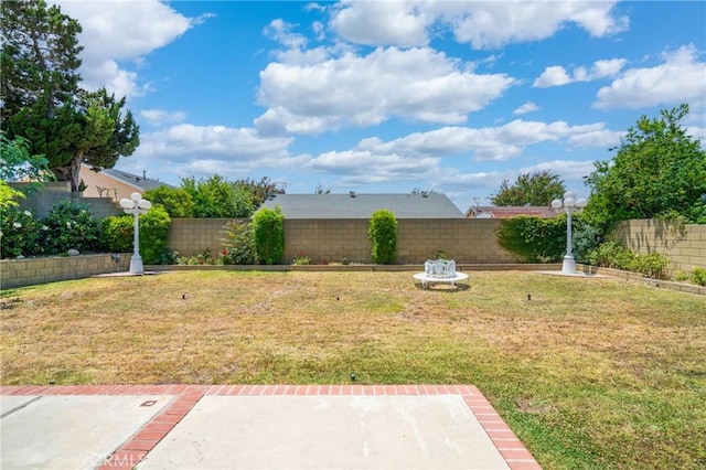 2215 Calmette Ave, Rowland Heights, CA 91748 - fenced backyard with a patio area