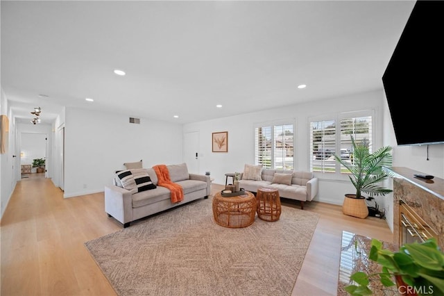 2215 Calmette Ave, Rowland Heights, CA 91748 - living area with light wood-type flooring and recessed lighting