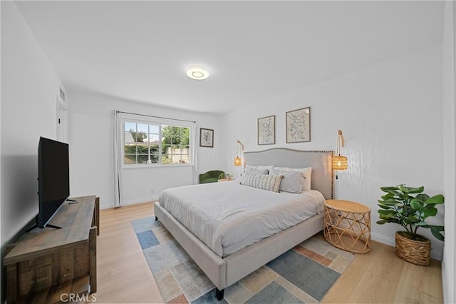 2215 Calmette Ave, Rowland Heights, CA 91748 - bedroom with light wood-style floors and baseboards